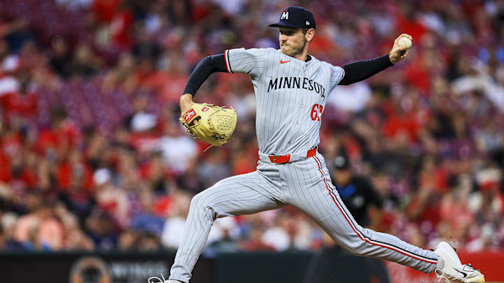 Jun 17, 2025; Cincinnati, Ohio, USA; Minnesota Twins relief pitcher Joey Wentz (63) pitches against the Cincinnati Reds in the fifth inning at Great American Ball Park. Jun 17, 2025; Cincinnati, Ohio, USA; Minnesota Twins relief pitcher Joey Wentz (63) pitches against the Cincinnati Reds in the fifth inning at Great American Ball Park.