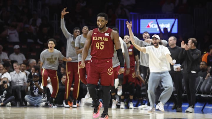 Nov 10, 2025; Miami, Florida, USA;  Cleveland Cavaliers guard Donovan Mitchell (45) and the Cavaliers bench react against the Miami Heat during the second half at Kaseya Center. Mandatory Credit: Rhona Wise-Imagn Images