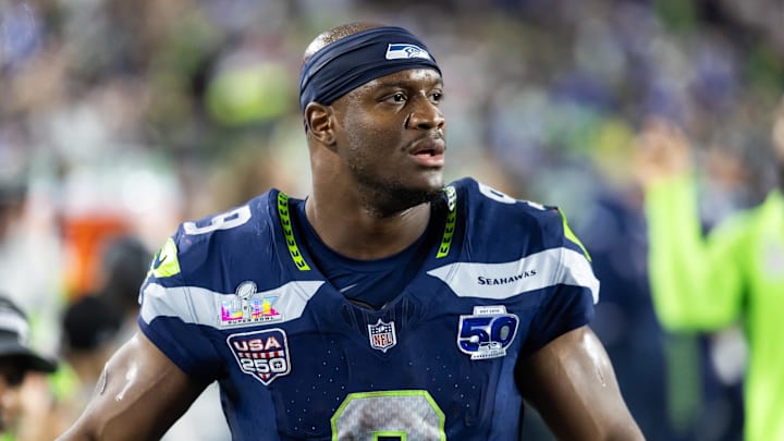 Seattle Seahawks running back Kenneth Walker III (9) looks on.
