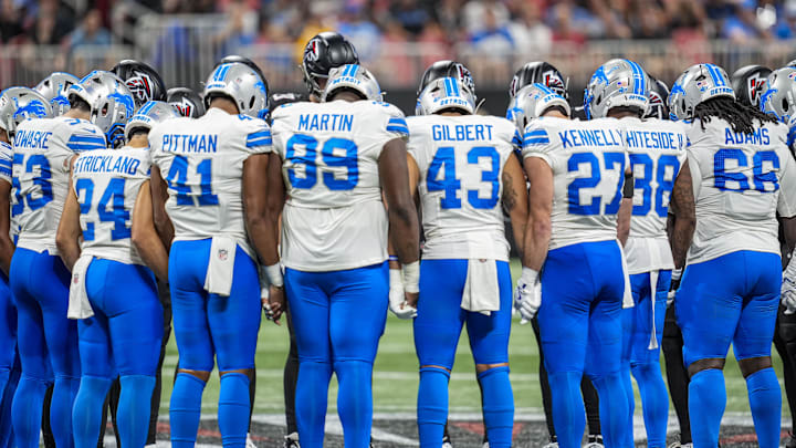 Detroit Lions and Atlanta Falcons players react on the field after an injury to Lions safety Morice Norris (26). Detroit Lions and Atlanta Falcons players react on the field after an injury to Lions safety Morice Norris (26).