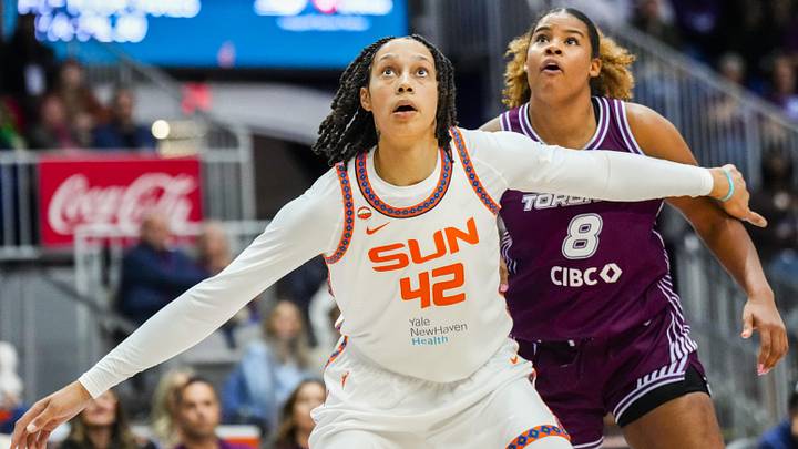 Apr 29, 2026; Toronto, ON, Canada;  Connecticut Sun center Brittney Griner (42) boxes out Toronto Tempo center Nyara Sabally (8) during the second half at Coca-Cola Coliseum. Mandatory Credit: Kevin Sousa-Imagn Images