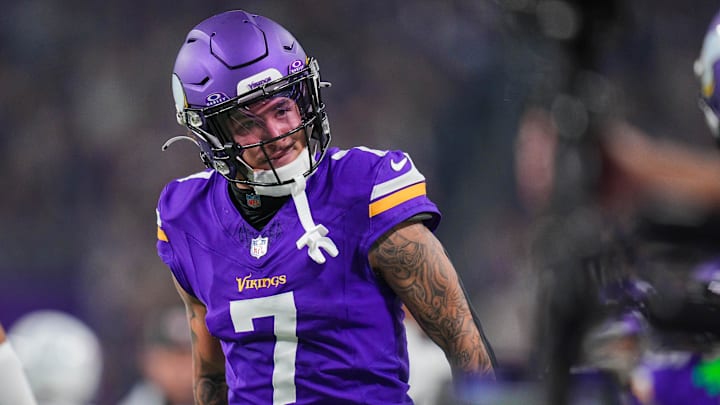 Nov 3, 2024; Minneapolis, Minnesota, USA; Minnesota Vikings cornerback Byron Murphy Jr. (7) celebrates his interception against the Indianapolis Colts in the fourth quarter at U.S. Bank Stadium. Mandatory Credit: Brad Rempel-Imagn Images