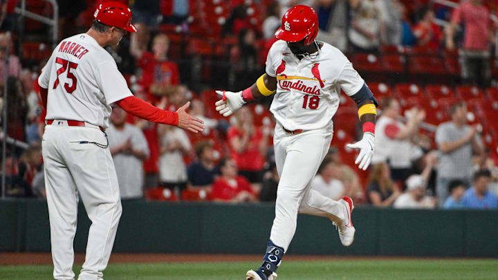 Apr 13, 2026; St. Louis, Missouri, USA; St. Louis Cardinals right fielder Jordan Walker (18) is congratulated by third base coach Ron Warner (75) after hitting a solo home run against the Cleveland Guardians during the sixth inning at Busch Stadium. Mandatory Credit: Jeff Curry-Imagn Images