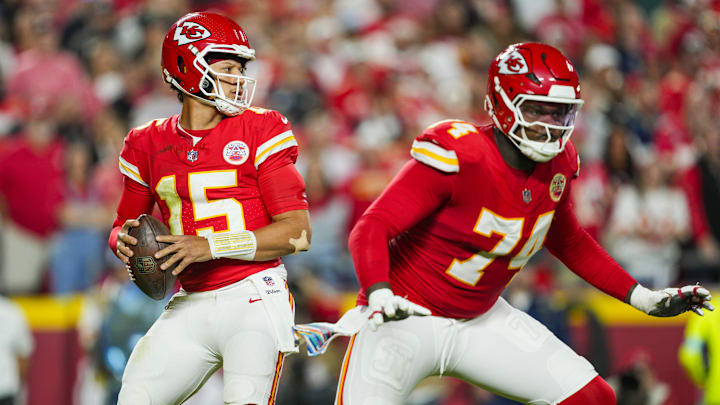 Oct 7, 2024; Kansas City, Missouri, USA; Kansas City Chiefs quarterback Patrick Mahomes (15) drops back to pass as offensive tackle Jawaan Taylor (74) gets ready to block during the first half against the New Orleans Saints at GEHA Field at Arrowhead Stadium. Mandatory Credit: Jay Biggerstaff-Imagn Images Oct 7, 2024; Kansas City, Missouri, USA; Kansas City Chiefs quarterback Patrick Mahomes (15) drops back to pass as offensive tackle Jawaan Taylor (74) gets ready to block during the first half against the New Orleans Saints at GEHA Field at Arrowhead Stadium. Mandatory Credit: Jay Biggerstaff-Imagn Images