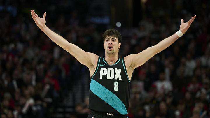 Nov 30, 2025; Portland, Oregon, USA; Portland Trail Blazers forward Deni Avdija (8) reacts toward an official during the second half in a game against the Oklahoma City Thunder at Moda Center. Mandatory Credit: Troy Wayrynen-Imagn Images