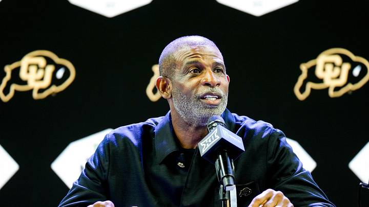 Jul 7, 2026; Frisco, TX, USA; Colorado head coach Deion Sanders speaks to reporters during Big 12 Conference Football Media Days at The Star. Mandatory Credit: Raymond Carlin III-Imagn Images Jul 7, 2026; Frisco, TX, USA; Colorado head coach Deion Sanders speaks to reporters during Big 12 Conference Football Media Days at The Star. Mandatory Credit: Raymond Carlin III-Imagn Images