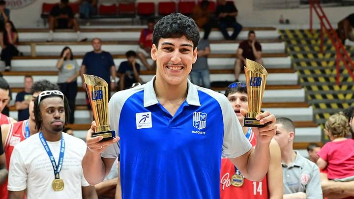 Brazilian big man Wini Braga shows off some international play hardware. Brazilian big man Wini Braga shows off some international play hardware.