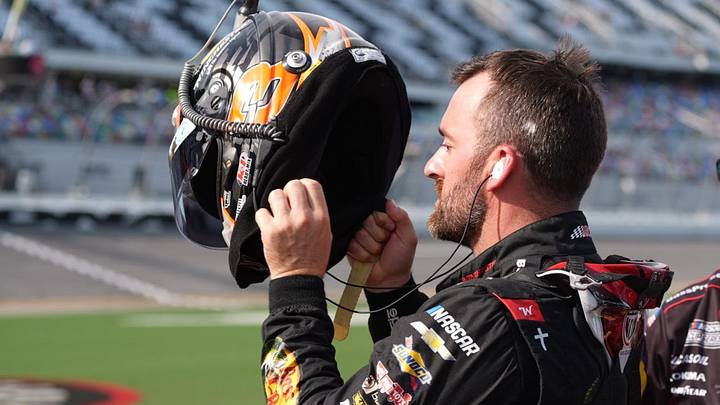 Austin Dillon puts on his helmet before qualifying for the Coke Zero Sugar 400 NASCAR Cup Series race on Aug. 28, 2026, at Daytona International Speedway. Austin Dillon puts on his helmet before qualifying for the Coke Zero Sugar 400 NASCAR Cup Series race on Aug. 28, 2026, at Daytona International Speedway.