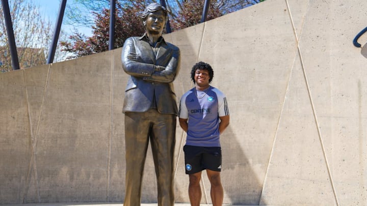 2027 running back Tre Segarra with the Pat Summitt statue 2027 running back Tre Segarra with the Pat Summitt statue
