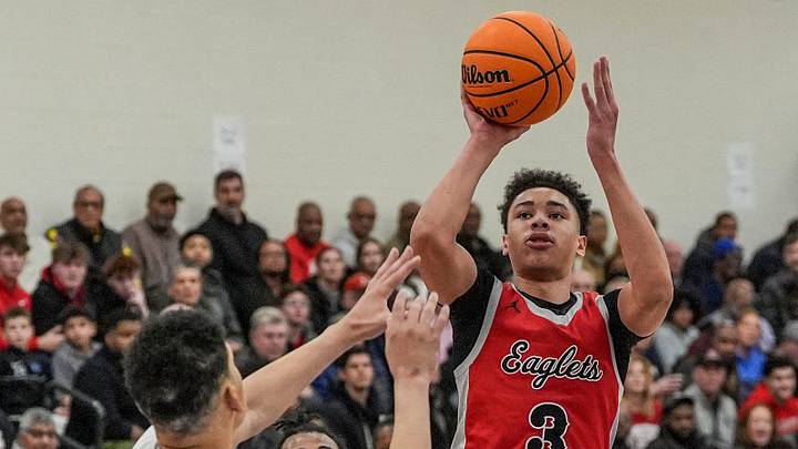 Orchard Lake St. Mary’s freshman guard Mateen Cleaves Jr. shoots the ball against Birmingham Brother Rice’s Jacob Lamb during the Detroit Catholic League semifinals at Marian High School in Bloomfield Twp., Tuesday, Feb. 11, 2025.