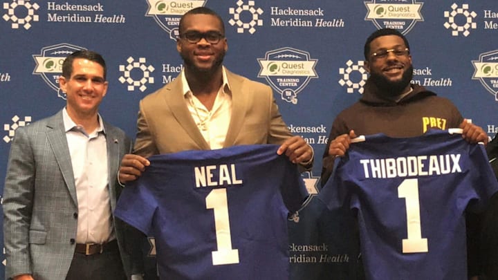 Giants general manager Joe Schoen, left, poses with first-round picks Evan Neal, center, and Kayvon Thibodeaux, right, at their introductory news conference Saturday in East Rutherford, NJ.
Schoen Neal Thibs A Giants general manager Joe Schoen, left, poses with first-round picks Evan Neal, center, and Kayvon Thibodeaux, right, at their introductory news conference Saturday in East Rutherford, NJ.
Schoen Neal Thibs A