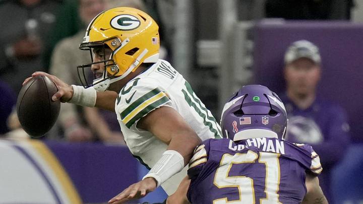 Minnesota Vikings linebacker Blake Cashman (51) sacks Green Bay Packers quarterback Jordan Love and forces a fumble. Minnesota Vikings linebacker Blake Cashman (51) sacks Green Bay Packers quarterback Jordan Love and forces a fumble.