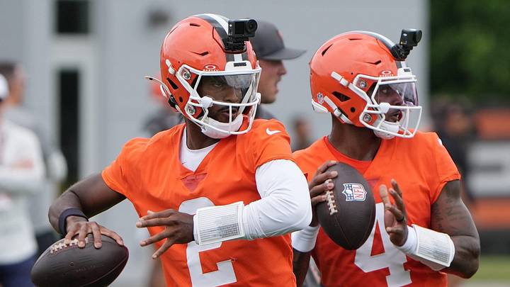 Cleveland Browns quarterbacks Shedeur Sanders and Deshaun Watson take part in a drill on the first day of minicamp at CrossCountry Mortgage Campus of the Cleveland Browns in Berea, Ohio on June 9, 2026. Cleveland Browns quarterbacks Shedeur Sanders and Deshaun Watson take part in a drill on the first day of minicamp at CrossCountry Mortgage Campus of the Cleveland Browns in Berea, Ohio on June 9, 2026.