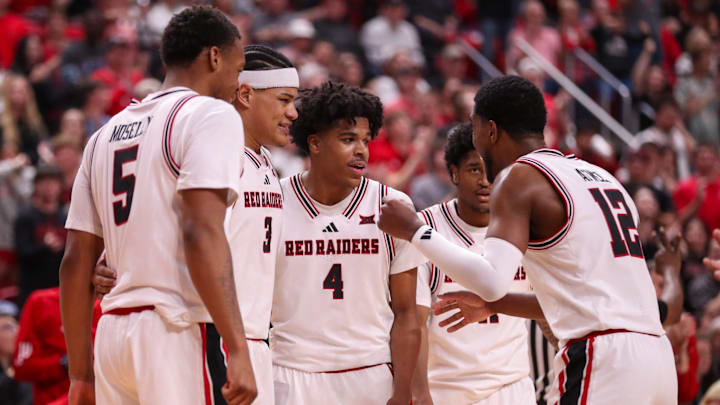 Texas Tech players Josiah Moseley (5), LeJuan Watts (3), Christian Anderson (4), Jaylen Petty (hidden) and Donovan Atwell huddle up after a foul call during a Big 12 Conference men's basketball game, Tuesday, Feb. 24, 2026, in United Supermarkets Arena.