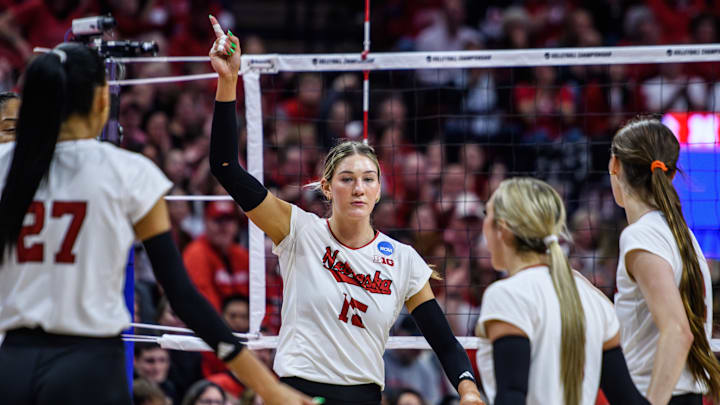 Andi Jackson waves her finger after a solo block.  