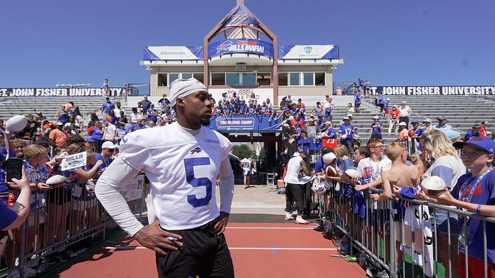 Buffalo Bills wide receiver Joshua Palmer (5) looks for his helmet after it disappeared while he was signing autographs at the end of practice on the opening day of the Bills' training camp at St. John Fisher University in Pittsford, New York, last summer on July 23, 2025. Buffalo Bills wide receiver Joshua Palmer (5) looks for his helmet after it disappeared while he was signing autographs at the end of practice on the opening day of the Bills' training camp at St. John Fisher University in Pittsford, New York, last summer on July 23, 2025.