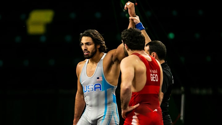 Zahid Valencia of the United States, left, has his hand raised after scoring a technical fall against Sandro Aminashvili of Georgia at 86 kg during the United World Wrestling men's freestyle World Cup, Saturday, Dec. 10, 2022, at Xtream Arena in Coralville, Iowa.

221210 Uww Freestyle Wc 091 Jpg