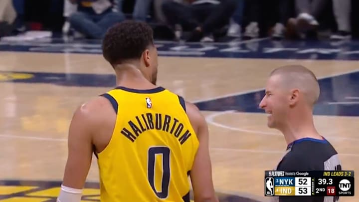 Tyrese Haliburton tries to convince Tyler Ford he was fouled. 