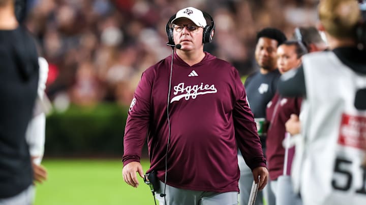 Nov 2, 2024; Columbia, South Carolina, USA; Texas A&M Aggies head coach Mike Elko directs his team against the South Carolina Gamecocks in the second quarter at Williams-Brice Stadium. Nov 2, 2024; Columbia, South Carolina, USA; Texas A&M Aggies head coach Mike Elko directs his team against the South Carolina Gamecocks in the second quarter at Williams-Brice Stadium.