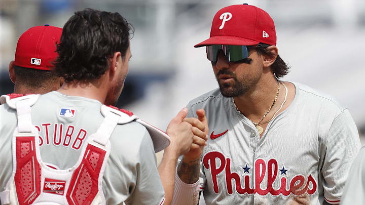 Jul 21, 2024; Pittsburgh, Pennsylvania, USA; Philadelphia Phillies catcher Garrett Stubbs (21) and right fielder Nick Castellanos (right) celebrate after defeating the Pittsburgh Pirates at PNC Park. The Phillies won 6-0 Jul 21, 2024; Pittsburgh, Pennsylvania, USA; Philadelphia Phillies catcher Garrett Stubbs (21) and right fielder Nick Castellanos (right) celebrate after defeating the Pittsburgh Pirates at PNC Park. The Phillies won 6-0