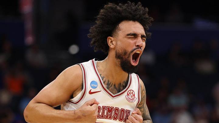 Mar 22, 2026; Tampa, FL, USA; Alabama Crimson Tide guard Houston Mallette (95) celebrates after a play against the Texas Tech Red Raiders in the first half during a second round game of the men's 2026 NCAA Tournament at Benchmark International Arena. Mandatory Credit: Nathan Ray Seebeck-Imagn Images