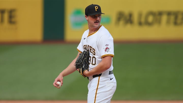 Pittsburgh Pirates pitcher Paul Skenes (30) eyes up the runner on first base during the second inning of his MLB Debut against the Chicago Cubs Saturday evening at PNC Park in Pittsburgh, PA.