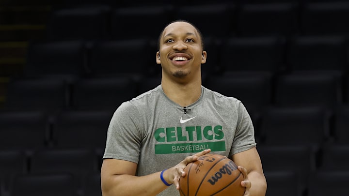 May 25, 2023; Boston, Massachusetts, USA; Boston Celtics forward Grant Williams (12) smiles as he warms-up prior to game five of the Eastern Conference Finals against the Miami Heat in the 2023 NBA playoffs at TD Garden. Mandatory Credit: Winslow Townson-Imagn Images