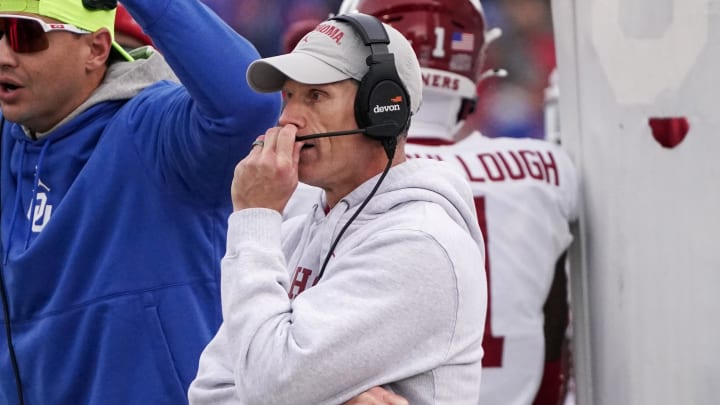 Oct 28, 2023; Lawrence, Kansas, USA; Oklahoma Sooners head coach Brent Venables watches play against the Kansas Jayhawks during the first half at David Booth Kansas Memorial Stadium. Mandatory Credit: Denny Medley-USA TODAY Sports Oct 28, 2023; Lawrence, Kansas, USA; Oklahoma Sooners head coach Brent Venables watches play against the Kansas Jayhawks during the first half at David Booth Kansas Memorial Stadium. Mandatory Credit: Denny Medley-USA TODAY Sports
