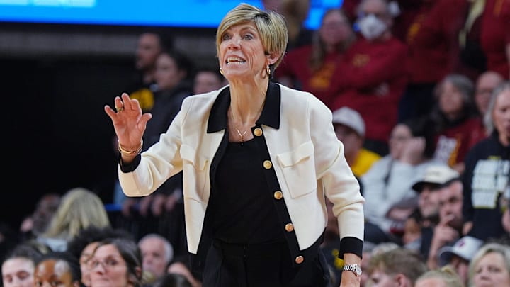 Iowa Hawkeyes women' basketball head coach Jan Jensen calls a play against Iowa during the fourth quarter in the NCAA women’s basketball Cy-Hawk Series on Dec. 10, 2025, at Hilton Coliseum in Ames, Iowa.