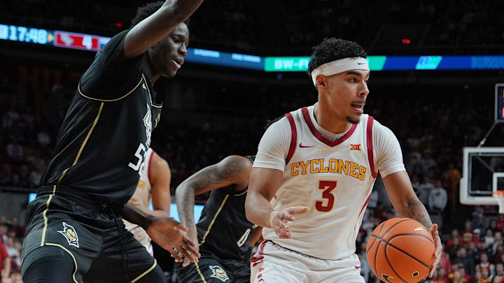Iowa State Cyclones guard Tamin Lipsey (3) drives with the ball around UCF Knights forward Moustapha Thiam (52) during the first half in the Big-12 men’s basketball at Hilton Coliseum onTuesday, Jan. 21, 2025 in Ames, Iowa.