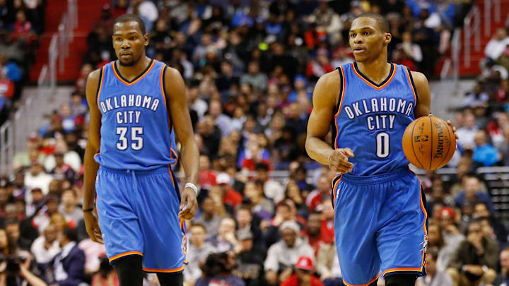Jan 21, 2015; Washington, DC, USA; Oklahoma City Thunder guard Russell Westbrook (0) dribbles the ball next to Thunder forward Kevin Durant (35) against the Washington Wizards at Verizon Center. Mandatory Credit: Geoff Burke-Imagn Images