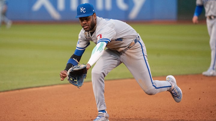Jun 18, 2024; Oakland, California, USA; Kansas City Royals third base Maikel Garcia (11) is unable to make a play on the ball during the fourth inning against the Oakland Athletics at Oakland-Alameda County Coliseum. 