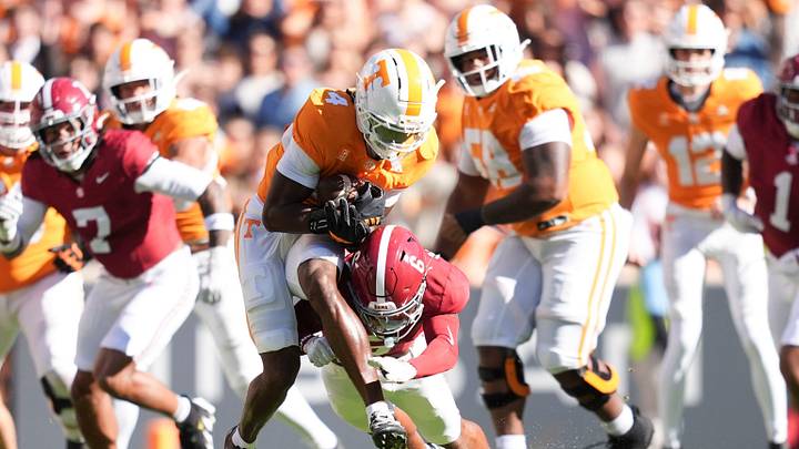 Tennessee wide receiver Mike Matthews (4) is tackled by Alabama defensive back Red Morgan (6) during a game between Tennessee and Alabama in Neyland Stadium in Knoxville, Tenn., Oct. 17, 2026. Tennessee wide receiver Mike Matthews (4) is tackled by Alabama defensive back Red Morgan (6) during a game between Tennessee and Alabama in Neyland Stadium in Knoxville, Tenn., Oct. 17, 2026.