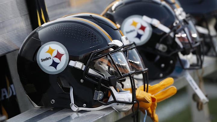 Aug 9, 2024; Pittsburgh, Pennsylvania, USA;  Pittsburgh Steelers helmets on the bench during the game against the Houston Texans during the first quarter at Acrisure Stadium. Mandatory Credit: Charles LeClaire-Imagn Images
