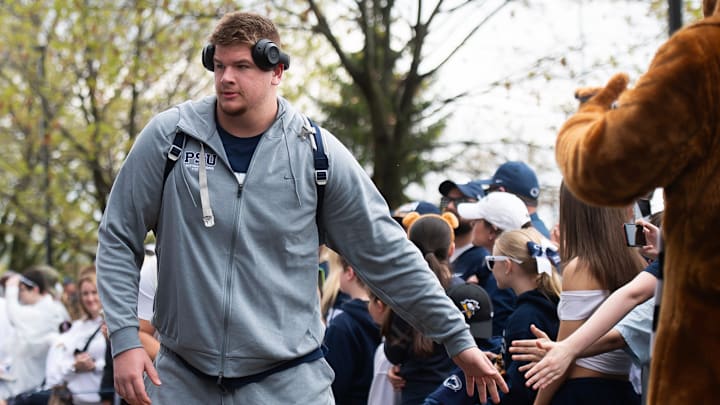 Penn State Nittany Lions offensive lineman Cooper Cousins greets fans outside Beaver Stadium before the 2025 Blue-White Game. Penn State Nittany Lions offensive lineman Cooper Cousins greets fans outside Beaver Stadium before the 2025 Blue-White Game.