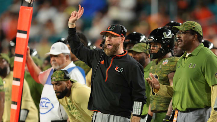 Oct 25, 2025; Miami Gardens, Florida, USA; Miami Hurricanes defensive coordinator Corey Hetherman reacts on the sideline against the Stanford Cardinal during the fourth quarter at Hard Rock Stadium. Mandatory Credit: Sam Navarro-Imagn Images