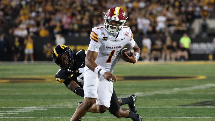 Sep 12, 2026; Iowa City, Iowa, USA; Iowa State Cyclones quarterback Jaylen Raynor (1) carries the ball as Iowa Hawkeyes defensive back Deshaun Lee (8) defends during the second quarter at Kinnick Stadium. Mandatory Credit: Reese Strickland-Imagn Images Sep 12, 2026; Iowa City, Iowa, USA; Iowa State Cyclones quarterback Jaylen Raynor (1) carries the ball as Iowa Hawkeyes defensive back Deshaun Lee (8) defends during the second quarter at Kinnick Stadium. Mandatory Credit: Reese Strickland-Imagn Images