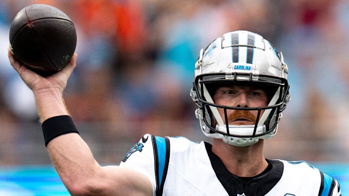Carolina Panthers quarterback Andy Dalton (14) throws a pass in the first quarter of the NFL game against the Cincinnati Bengals at Bank of America Stadium in Charlotte, N.C., on Sunday, Sept. 29, 2024.
