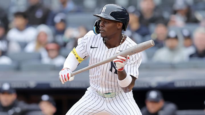 New York Yankees second baseman Jazz Chisholm Jr. squares to bunt against the Milwaukee Brewers.