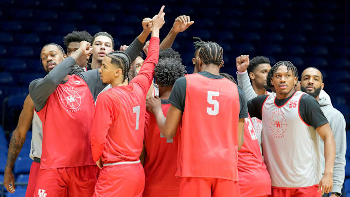 Houston players huddle during a practice on March 27, 2025 prior to the NCAA Tournament's Midwest Regional.
