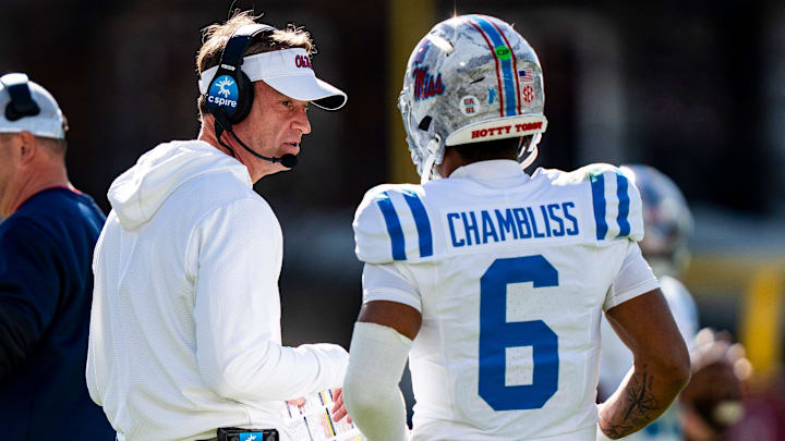 Ole Miss head coach Lane Kiffin talks with quarterback Trinidad Chambliss (6) during a college football game between Mississippi State and Ole Miss at Davis Wade Stadium in Starkville, Miss., on Friday, Nov. 28, 2025. Ole Miss defeated Mississippi State 38-19 in the Egg Bowl. Ole Miss head coach Lane Kiffin talks with quarterback Trinidad Chambliss (6) during a college football game between Mississippi State and Ole Miss at Davis Wade Stadium in Starkville, Miss., on Friday, Nov. 28, 2025. Ole Miss defeated Mississippi State 38-19 in the Egg Bowl.