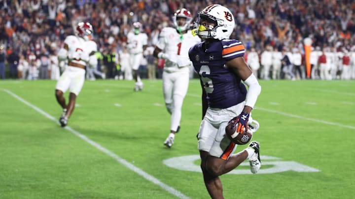 Nov 25, 2023; Auburn, Alabama, USA; Auburn Tigers wide receiver Ja'Varrius Johnson (6) scores a