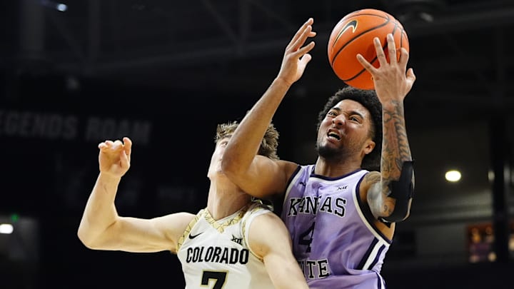 Kansas State guard P.J. Haggerty battles Colorado forward Sebastian Rancik for a rebound in the second half at the CU Events Center. 