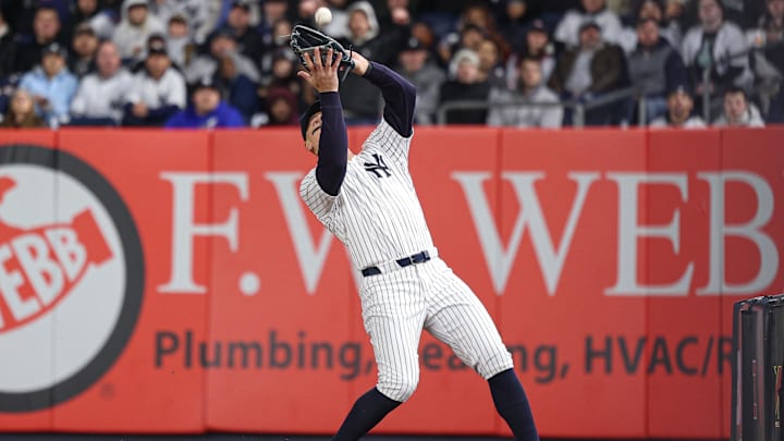 Apr 2, 2025; Bronx, New York, USA; New York Yankees center fielder Aaron Judge (99) catches a fly ball hit by Arizona Diamondbacks right fielder Randal Grichuk (15) for an out during the sixth inning at Yankee Stadium.
