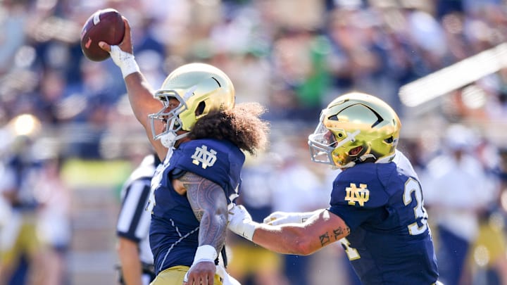 Sep 21, 2024; South Bend, Indiana, USA; Notre Dame Fighting Irish defensive lineman Junior Tuihalamaka (44) celebrates after an interception in the first quarter against the Miami Redhawks at Notre Dame Stadium. Mandatory Credit: Matt Cashore-Imagn Images Sep 21, 2024; South Bend, Indiana, USA; Notre Dame Fighting Irish defensive lineman Junior Tuihalamaka (44) celebrates after an interception in the first quarter against the Miami Redhawks at Notre Dame Stadium. Mandatory Credit: Matt Cashore-Imagn Images