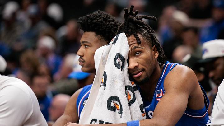 Mar 13, 2026; Kansas City, MO, USA; Kansas Jayhawks guard Darryn Peterson (22) reacts on the bench towards the end of the game against the Houston Cougars at T-Mobile Center. Mandatory Credit: William Purnell-Imagn Images