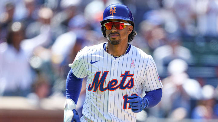 May 11, 2025; New York City, New York, USA; New York Mets shortstop Francisco Lindor (12) looks back at the Mets dugout after hitting a solo home run during the eighth inning against the Chicago Cubs at Citi Field. Mandatory Credit: Vincent Carchietta-Imagn Images