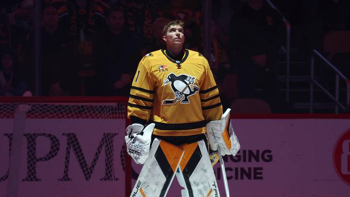 Nov 22, 2025; Pittsburgh, Pennsylvania, USA;  Pittsburgh Penguins goaltender Sergei Murashov (1) stands for the national anthem against the Seattle Kraken at PPG Paints Arena. Mandatory Credit: Charles LeClaire-Imagn Images