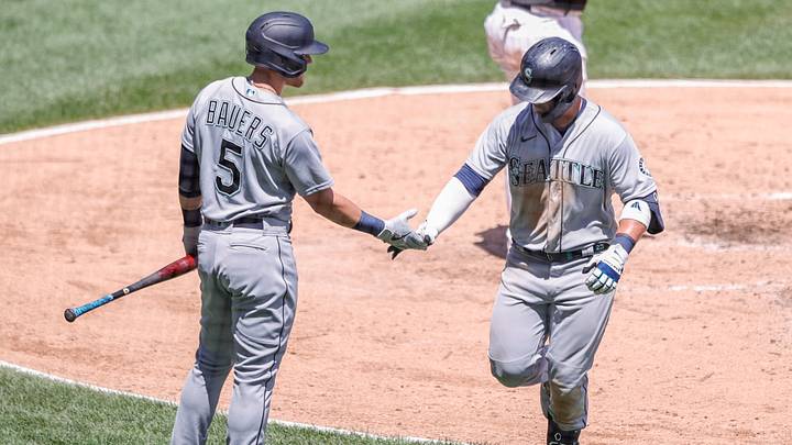 Jun 27, 2021; Chicago, Illinois, USA; Seattle Mariners third baseman Ty France (23) celebrates with first baseman Jake Bauers (5) after hitting a solo home run against the Chicago White Sox during the sixth inning of the first game of a doubleheader at Guaranteed Rate Field. Mandatory Credit: Kamil Krzaczynski-USA TODAY Sports Jun 27, 2021; Chicago, Illinois, USA; Seattle Mariners third baseman Ty France (23) celebrates with first baseman Jake Bauers (5) after hitting a solo home run against the Chicago White Sox during the sixth inning of the first game of a doubleheader at Guaranteed Rate Field. Mandatory Credit: Kamil Krzaczynski-USA TODAY Sports