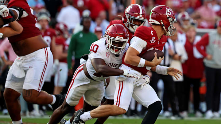 Nov 15, 2025; Tuscaloosa, Alabama, USA;  Oklahoma Sooners linebacker Kip Lewis (10) pressures Alabama Crimson Tide quarterback Ty Simpson (15) during the first half at Saban Field at Bryant-Denny Stadium. Mandatory Credit: David Leong-Imagn Images